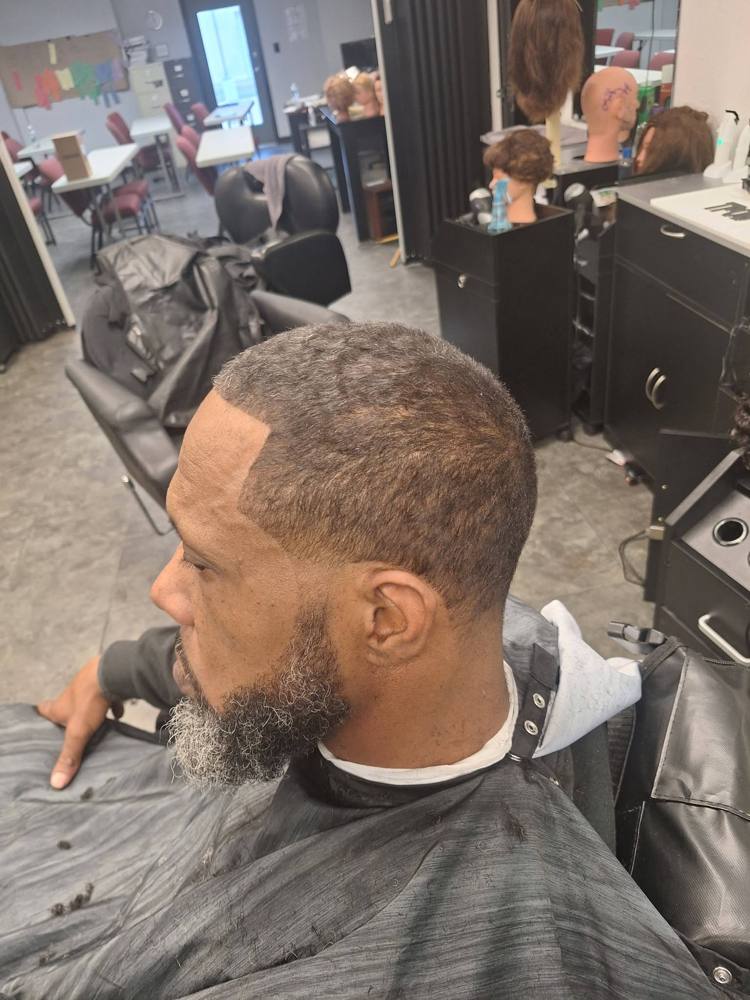 Classic short cut with a salt-and-pepper beard